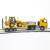 CAMION GONDOLA MAN CON EXCAVADORA